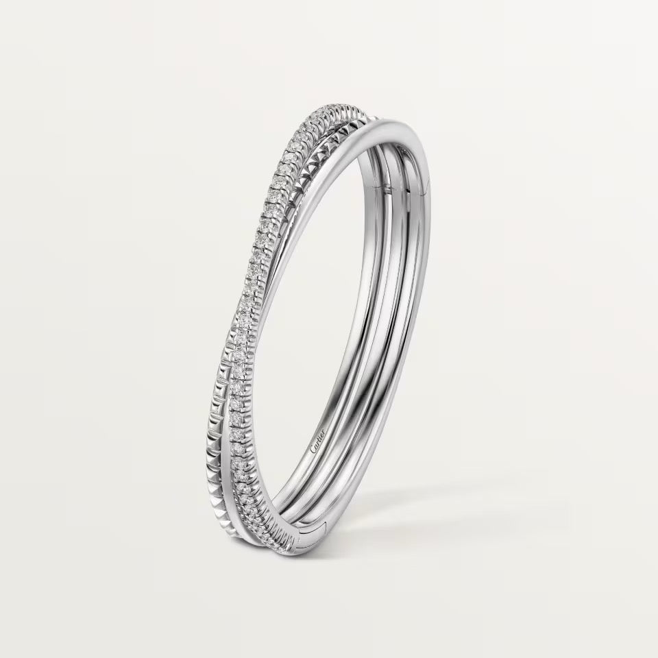 ÉTINCELLE DE CARTIER ARMREIF, HALB AUSGEFASST