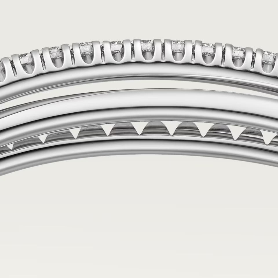 ÉTINCELLE DE CARTIER ARMREIF, HALB AUSGEFASST